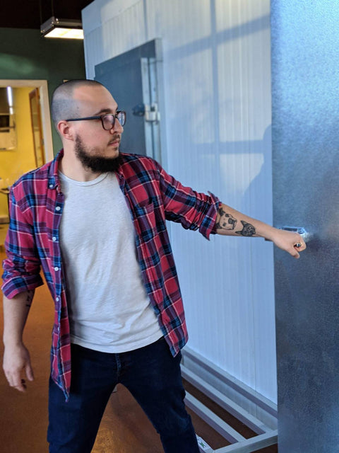 Matt opening freezer door.