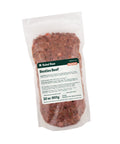 Package of Rebel Raw Besties Beef 32 oz dog food with a label on a white background