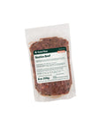 Package of Rebel Raw Besties Beef 8 oz dog food with a label on a white background