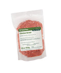 Package of Rebel Raw Chicken Grind pet food on a white background