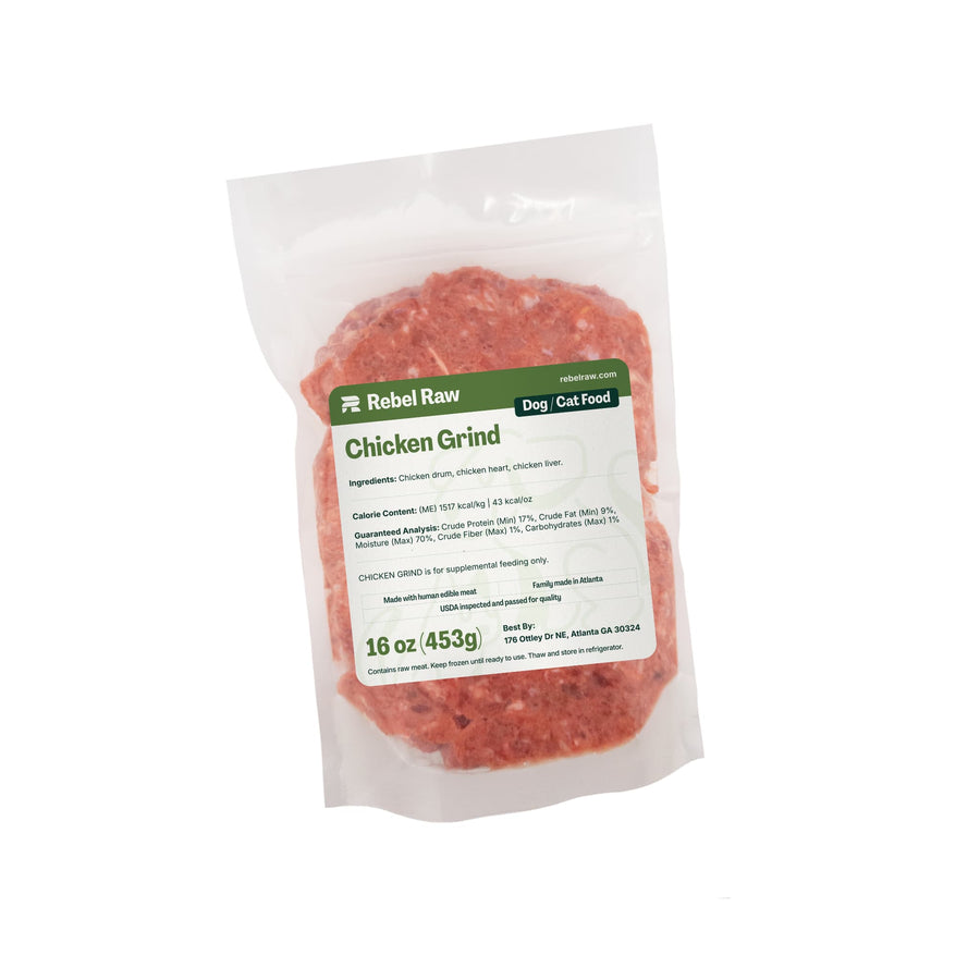 Package of Rebel Raw Chicken Grind pet food on a white background