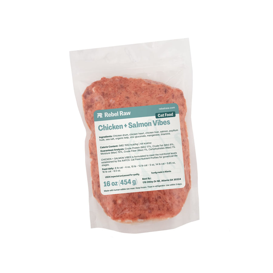 Package of 16 oz Rebel Raw Chicken + Salmon Vibes cat food on a white background