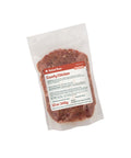 Package of Rebel Raw Comfy Chicken 12 oz dog food on a white background
