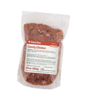Package of Rebel Raw Comfy Chicken 24 oz dog food on a white background