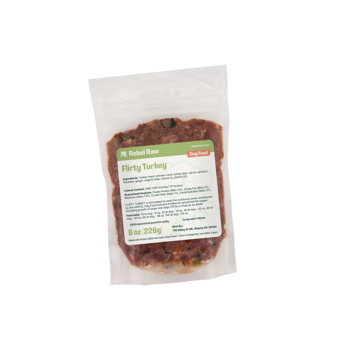 Package of Rebel Raw Flirty Turkey 8 oz dog food on a white background