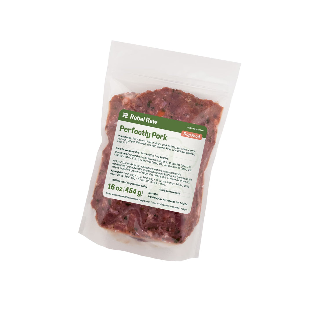Package of Rebel Raw Perfectly Pork 16 oz dog food with a label on a white background