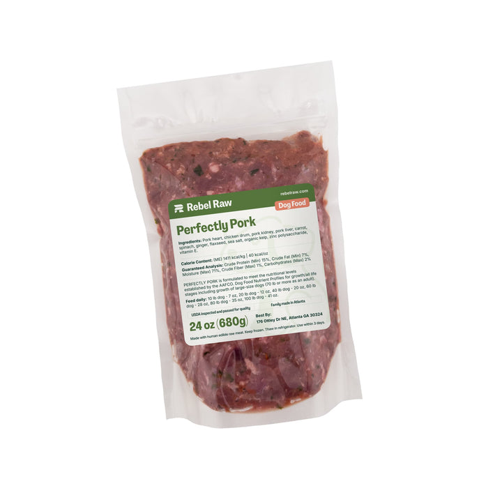 Package of Rebel Raw Perfectly Pork 24 oz dog food with a label on a white background