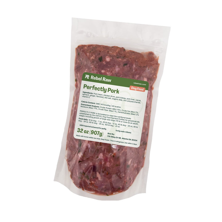 Package of Rebel Raw Perfectly Pork 32 oz dog food with a label on a white background