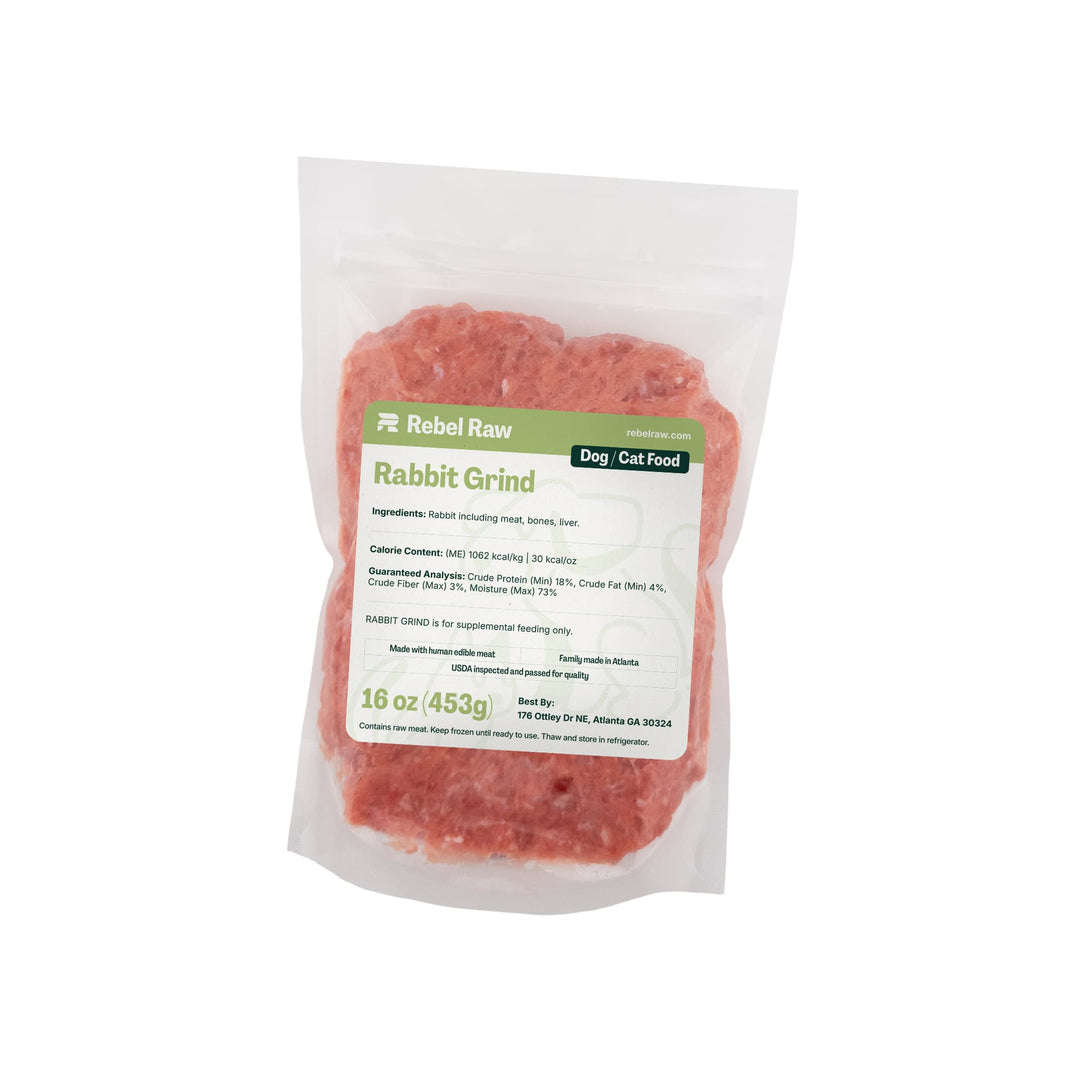 Package of Rebel Raw Rabbit Grind dog and cat food on a white background