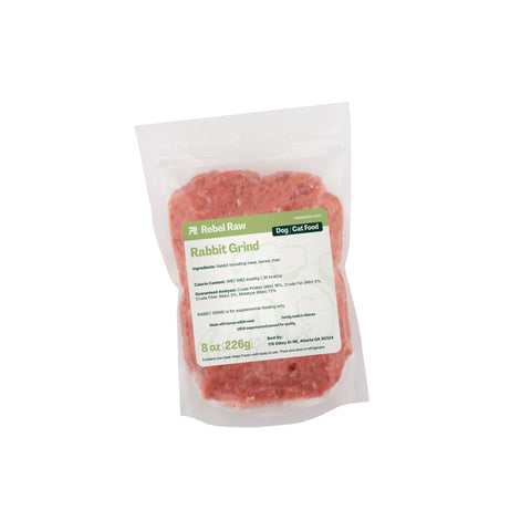 Package of Rebel Raw Rabbit Grind cat and dog food on a white background