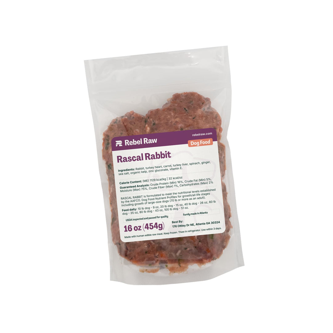 Package of Rebel Raw Rascal Rabbit 16 oz dog food on a white background