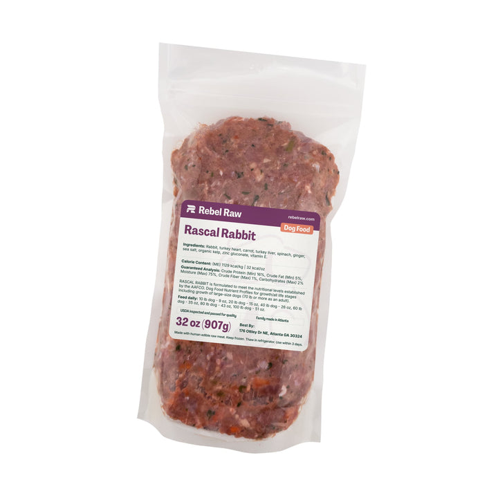 Package of Rebel Raw Rascal Rabbit 32 oz dog food on a white background
