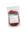 Package of Rebel Raw Venison Grind dog and cat food on a white background