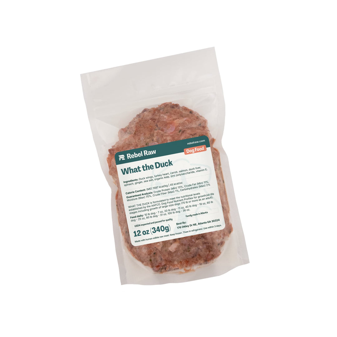 Package of Rebel Raw What the Duck 12 oz dog food on a white background